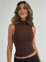 Solid Color Sleeveless Mock Neck Lace Hem Fitted Crop Top